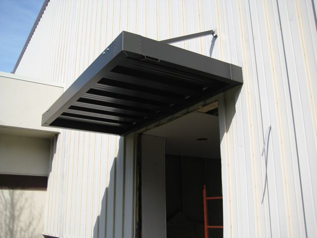 Overhead canopy for loading dock